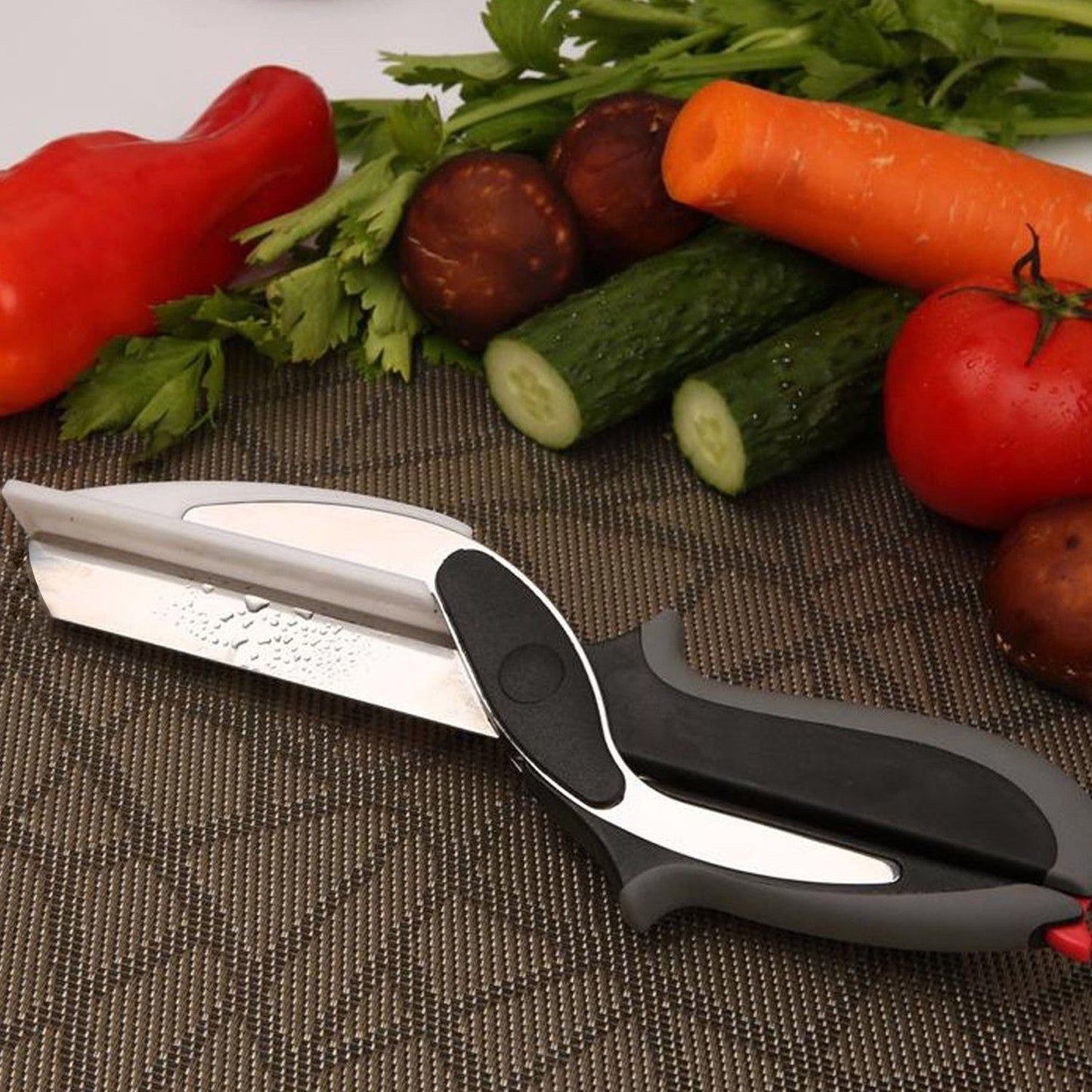 2-in-1 food chopper with handle for versatile cutting and dicing.