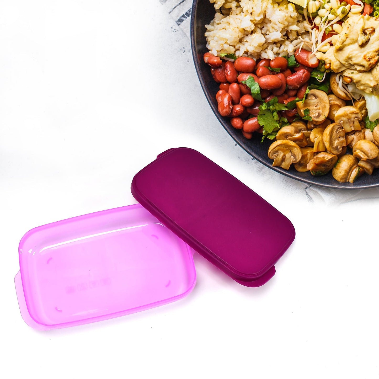 Easy-to-clean plastic lunch box with multiple compartments.