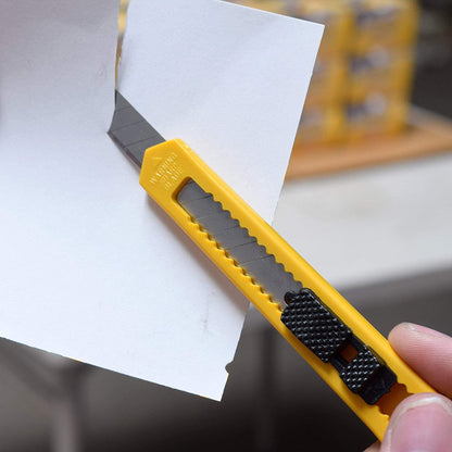 Paper cutter with safety guard