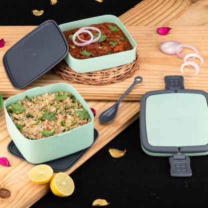 Portable green lunch box with spoon for meals