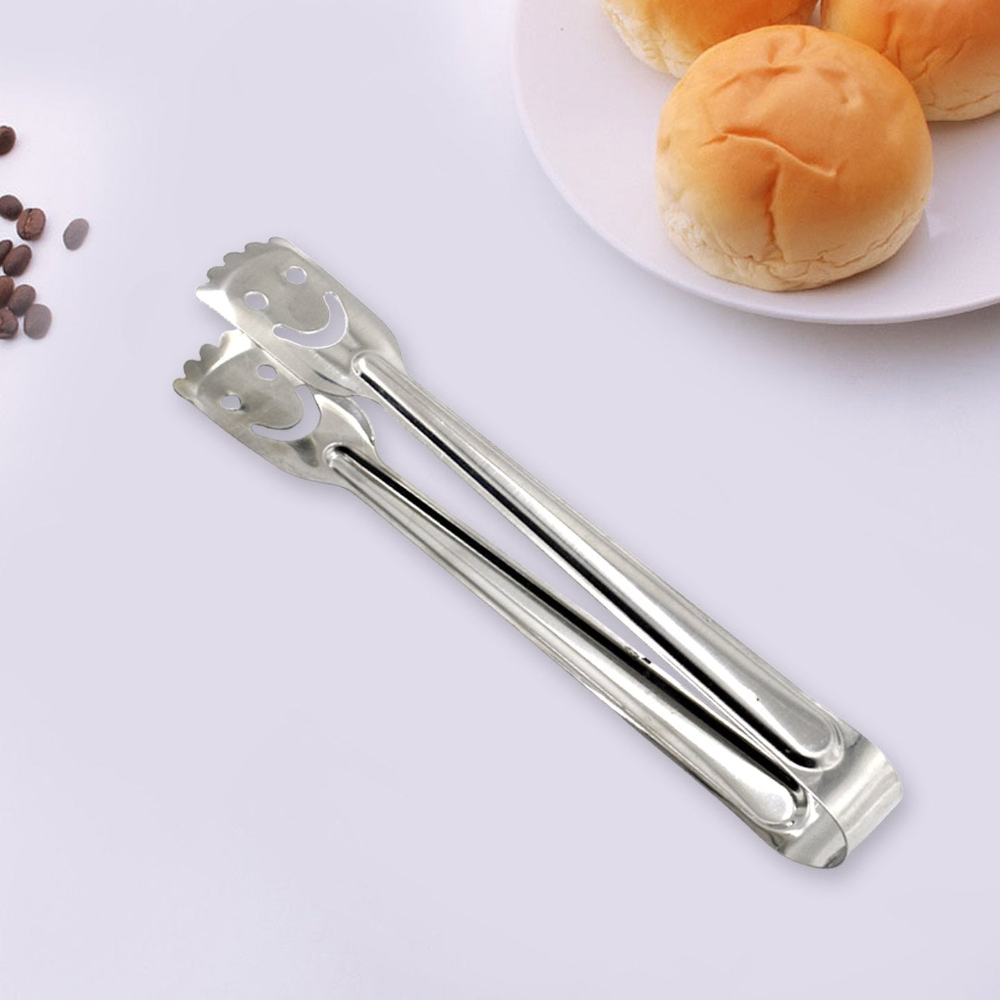 Multipurpose stainless steel utility tongs, 1 piece, for various kitchen tasks.