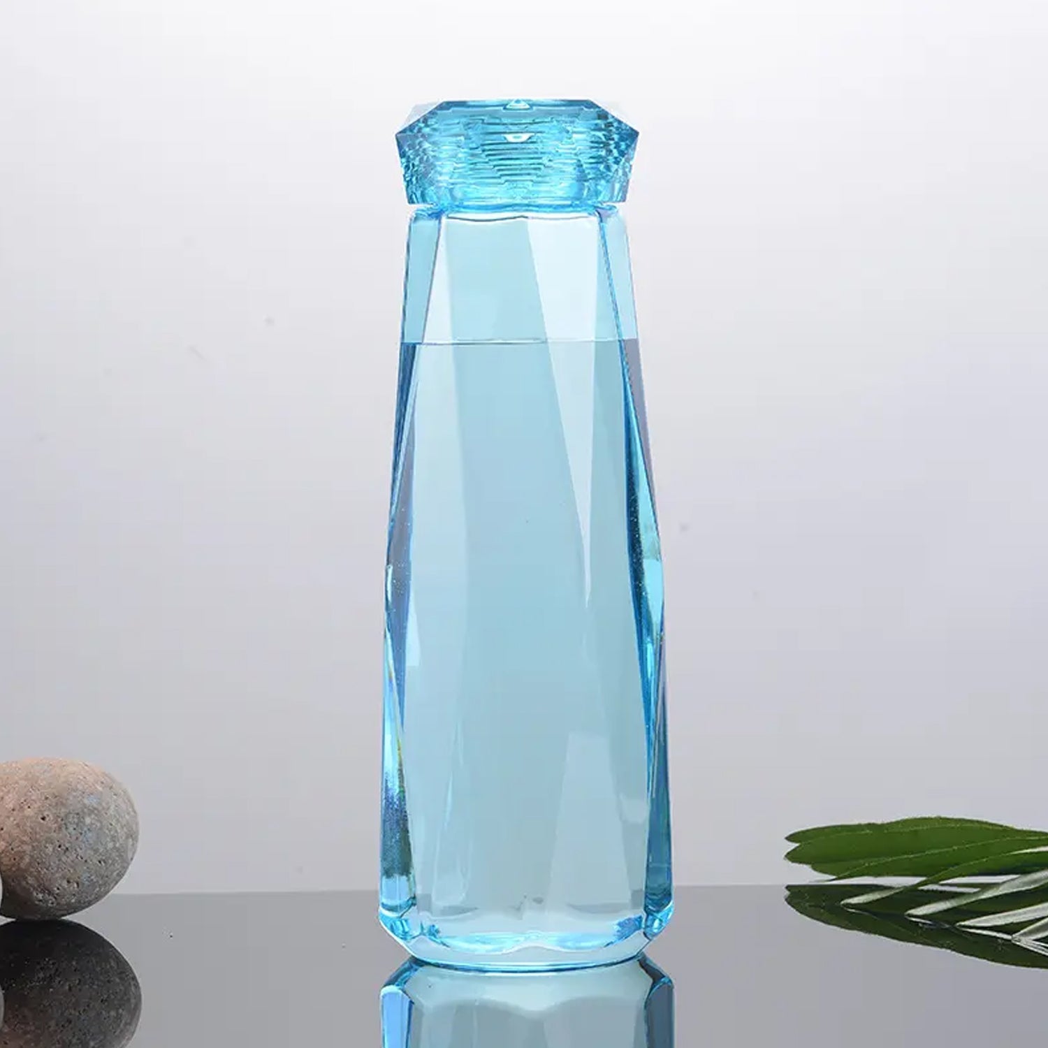 Glass water bottle with plastic top