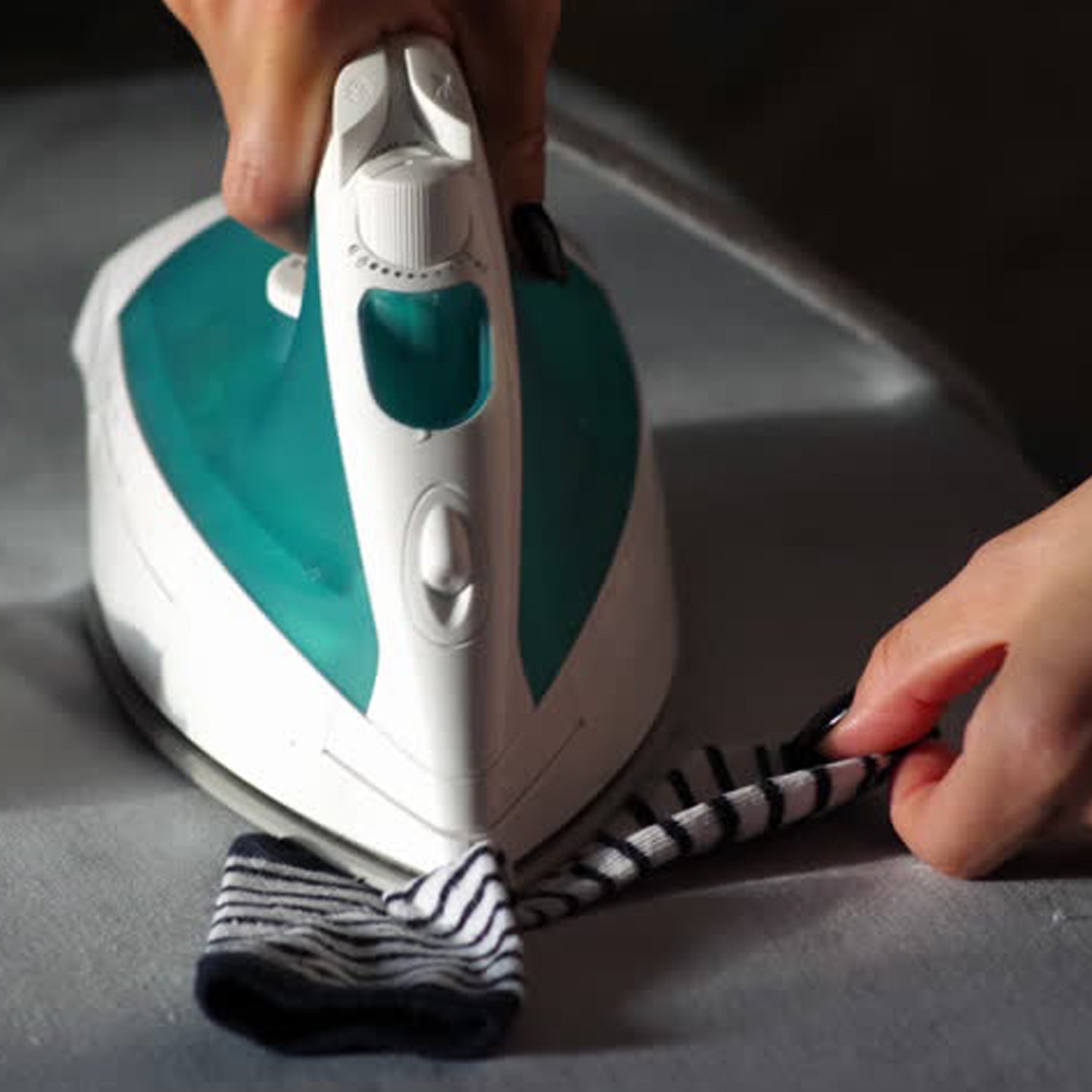 Portable ironing pad, designed for home and shop use to press fabrics.