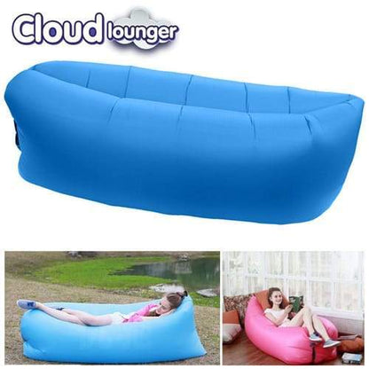 Inflatable lounger sofa with vibrant color in a camping scene