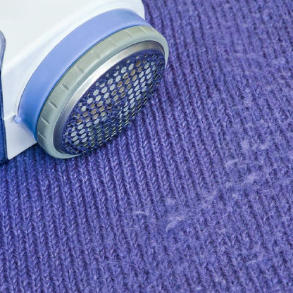 Detailed image of the lint remover, highlighting its design for removing lint from woolens