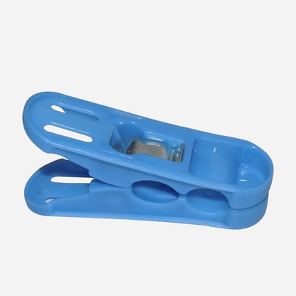 Multicolored plastic clips with strong grip for cloth drying.