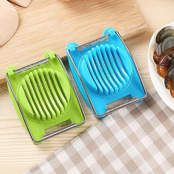 Multi-functional egg slicer with stainless steel wires and plastic frame