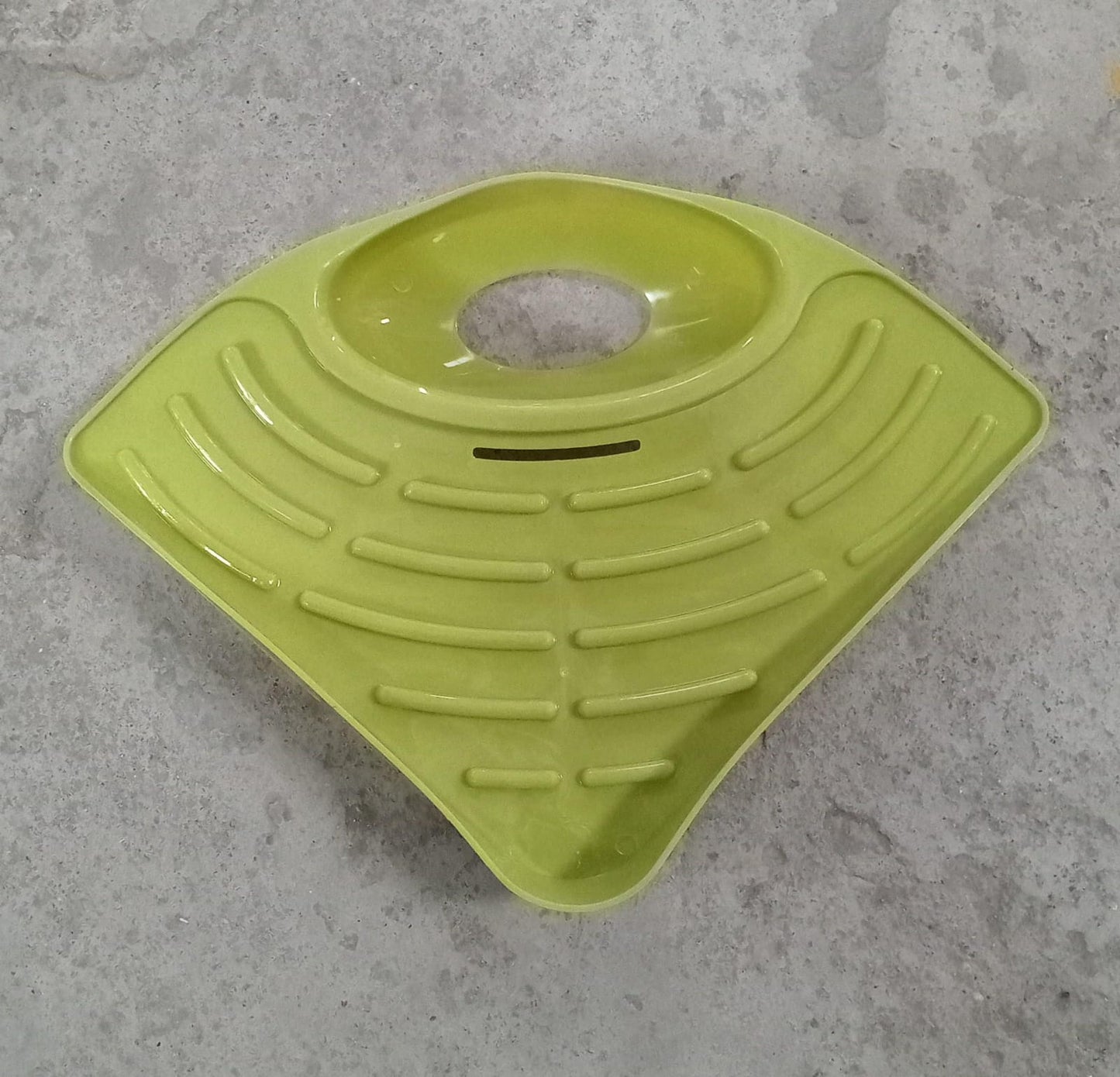 Corner sink strainer basket, triangular drain shelf for kitchen organization.